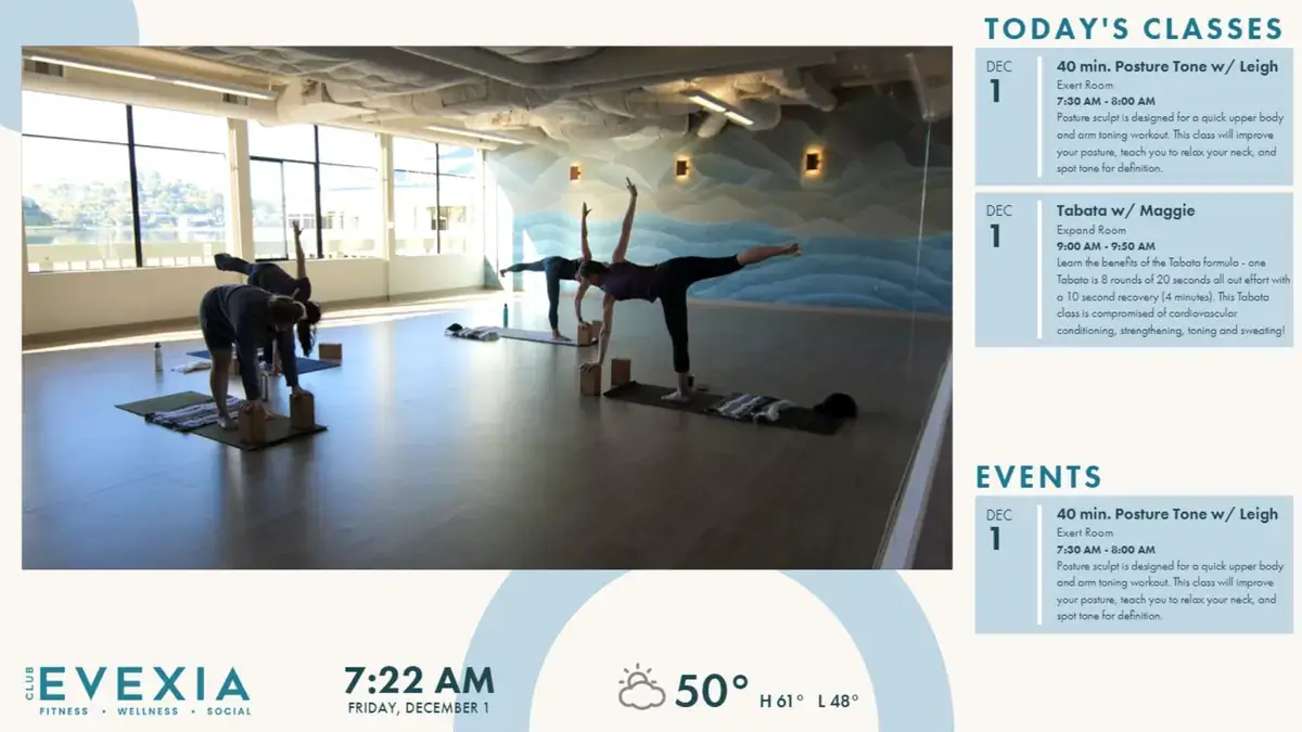 Club Evexia fitness and wellness digital signage screen from Reach Media Network displaying daily classes, events, and fitness-related imagery.