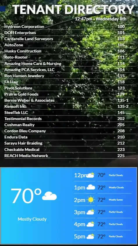 REACH Media Network Prairie Spring digital signage directory displaying building tenants with forest background image and 7-day weather forecast
